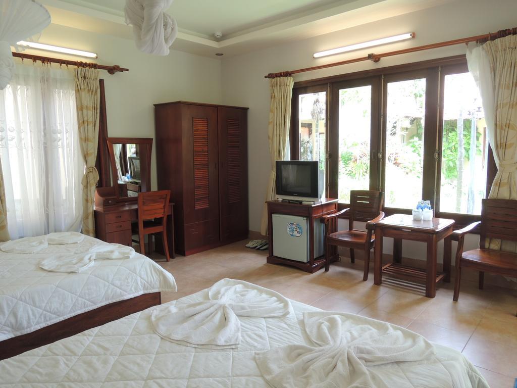 Hôtel Ngoc Bich Bungalow à Phan Thiết Chambre photo